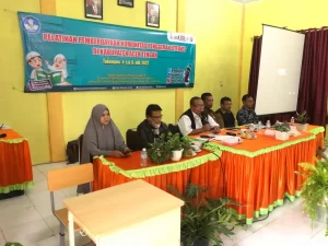 Bapak Karyono memberikan sambutan di aula dalam pembukaan Pelatihan Pemberdayaan Komunitas Penggerak Literasi di Kabupaten Aceh Tengah